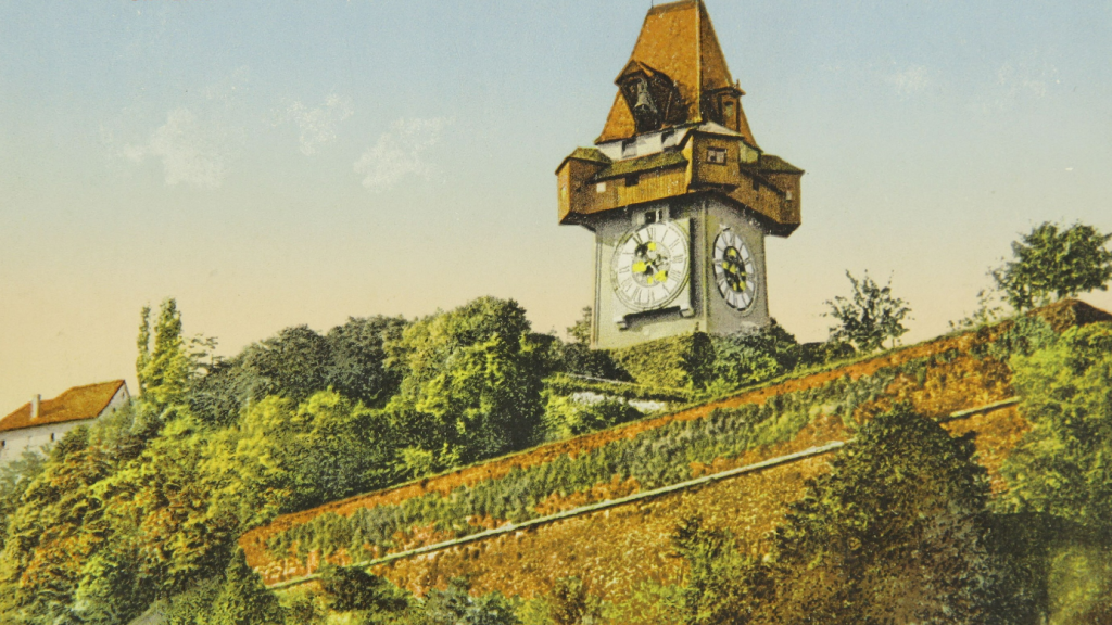 Eine kolorierte Postkarte mit dem Grazer Uhrturm.